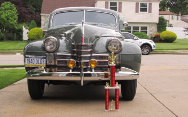 Oldsmobile-Custom-Cruiser-Berline-1940-32