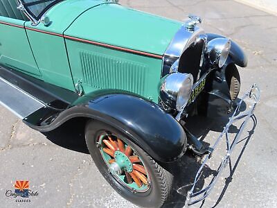 Buick-Model-24-DeLuxe-Sport-Roadster-Cabriolet-1928-35