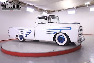 Dodge-D100-SWEPTSIDE-1957-1