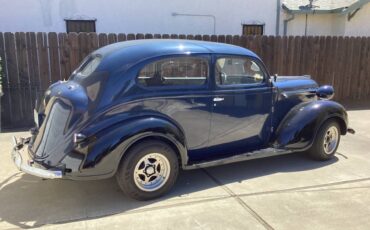 Plymouth-Two-door-humpback-1938-16