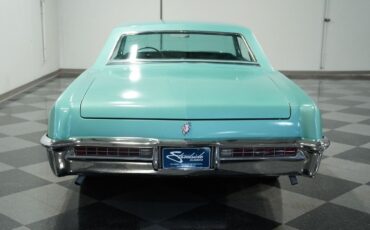 Buick-Riviera-Coupe-1965-Turquoise-Mist-Black-101427-9