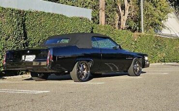 Cadillac-DeVille-Cabriolet-1979-Black-Red-180247-3