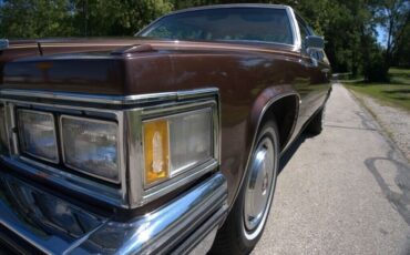 Cadillac-DeVille-Coupe-1977-Brown-Tan-80689-11