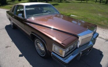 Cadillac-DeVille-Coupe-1977-Brown-Tan-80689-7