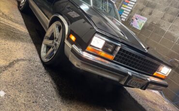 Chevrolet-El-Camino-1987-Black-Gray-56900-8