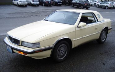 Chrysler-Lebaron-tc-1990-yellow-152887