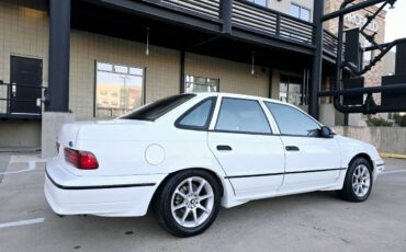 Ford-Taurus-sho-1990-white-92962-11