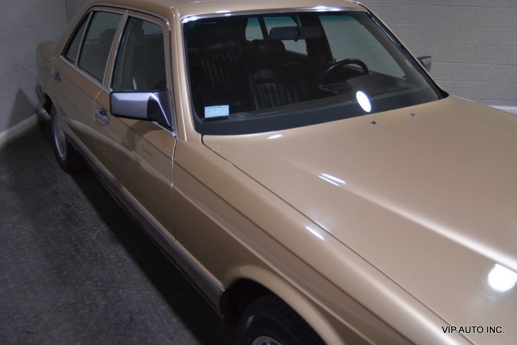 Mercedes-Benz-500-Series-1986-Gold-Red-88437-4