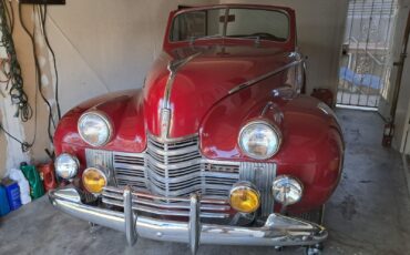 Oldsmobile-Custom-Cruiser-Cabriolet-1940-Burgundy-Red-1609344