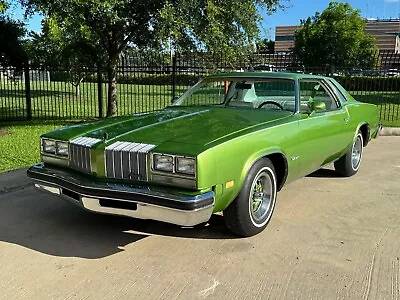 Oldsmobile-Cutlass-1976-green-64374