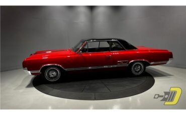 Oldsmobile-Cutlass-Coupe-1965-Red-Black-132080-1