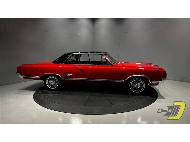 Oldsmobile-Cutlass-Coupe-1965-Red-Black-132080-10