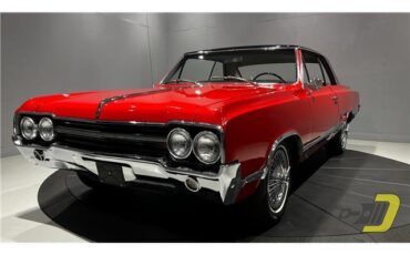 Oldsmobile-Cutlass-Coupe-1965-Red-Black-132080-23