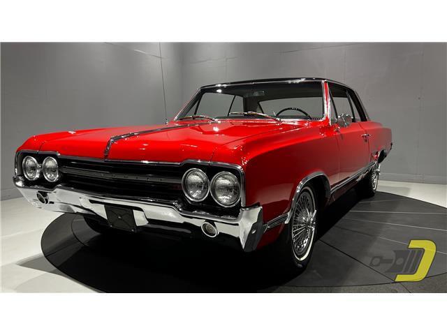 Oldsmobile-Cutlass-Coupe-1965-Red-Black-132080-23