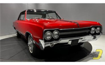 Oldsmobile-Cutlass-Coupe-1965-Red-Black-132080-24