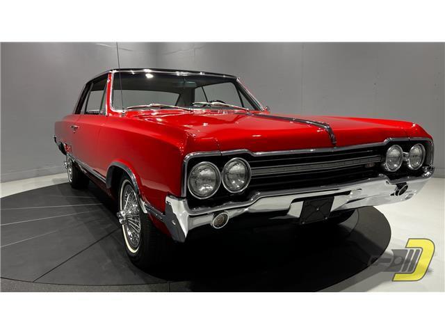 Oldsmobile-Cutlass-Coupe-1965-Red-Black-132080-24