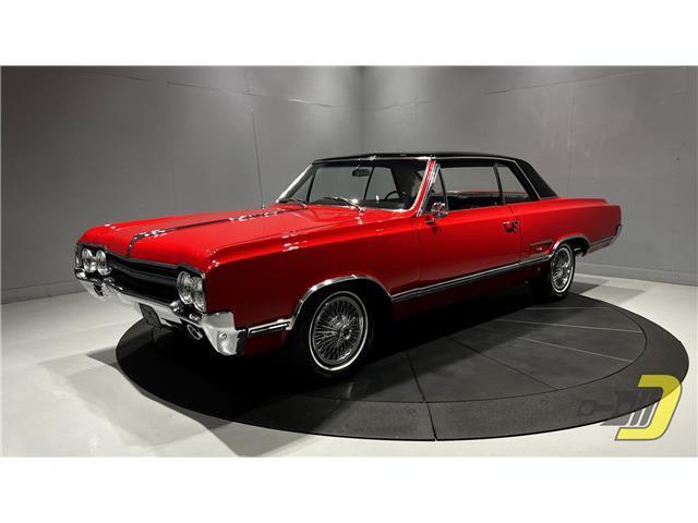 Oldsmobile-Cutlass-Coupe-1965-Red-Black-132080-27