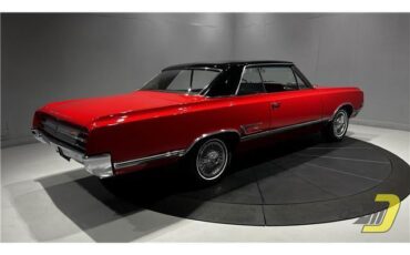 Oldsmobile-Cutlass-Coupe-1965-Red-Black-132080-28