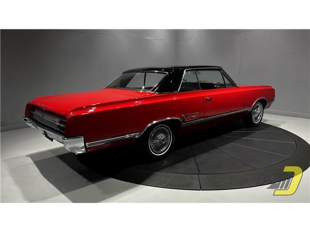 Oldsmobile-Cutlass-Coupe-1965-Red-Black-132080-28