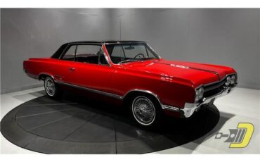 Oldsmobile-Cutlass-Coupe-1965-Red-Black-132080-29