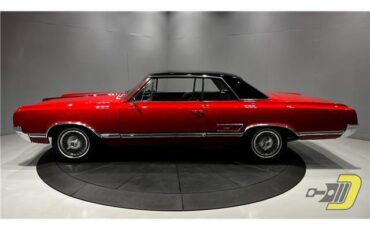 Oldsmobile-Cutlass-Coupe-1965-Red-Black-132080-31