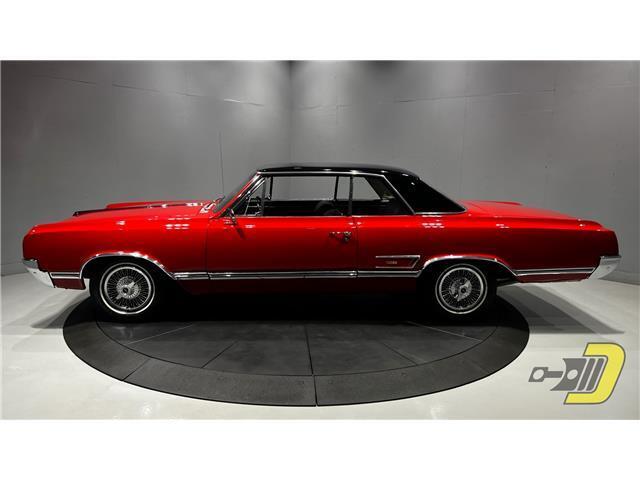 Oldsmobile-Cutlass-Coupe-1965-Red-Black-132080-31