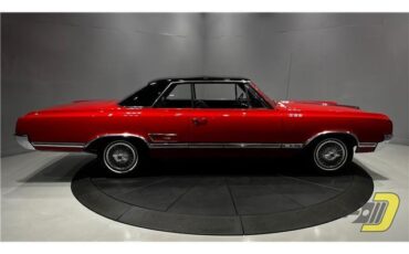 Oldsmobile-Cutlass-Coupe-1965-Red-Black-132080-32