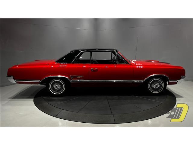 Oldsmobile-Cutlass-Coupe-1965-Red-Black-132080-32