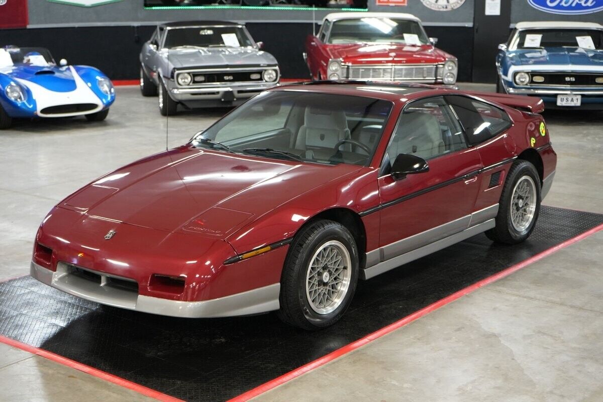 Pontiac-Fiero-Coupe-1987-Maroon-Gray-0-9