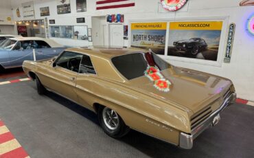 Pontiac-Grand-Prix-1967-Gold-Black-0-2