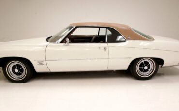 Buick-Centurion-1973-White-Saddle-213689-1