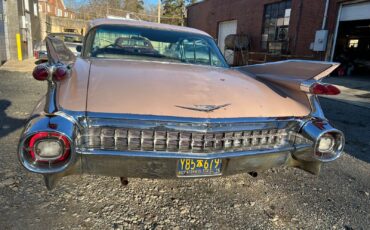 Cadillac-DeVille-Berline-1959-Pink-Pink-49085-26