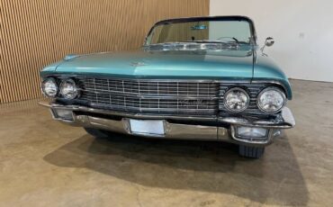 Cadillac-Deville-1962-blue-9584-4