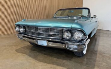 Cadillac-Deville-1962-blue-9584-5