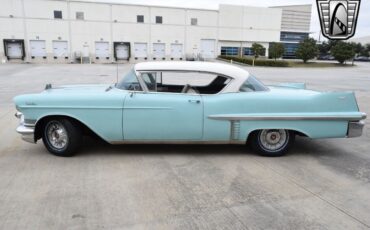 Cadillac-Series-62-Coupe-1957-Teal-White-100986-2