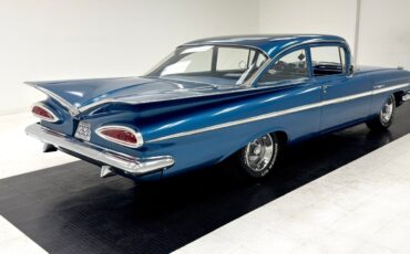 Chevrolet-Bel-Air150210-Berline-1959-Blue-Blue-64372-4