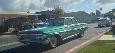 Chevrolet-Biscayne-Coupe-1961-Teal-Teal-144841-3