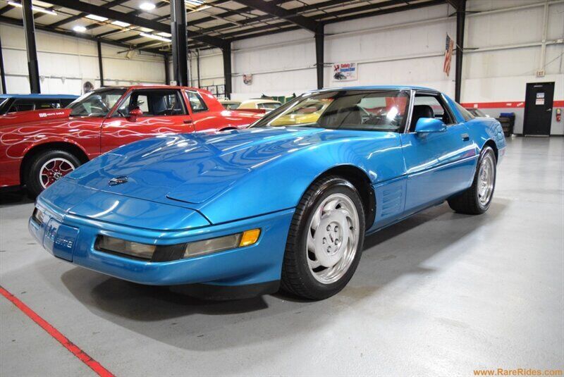 Chevrolet-Corvette-1994-Bright-Aqua-Metallic-Black-133867-1