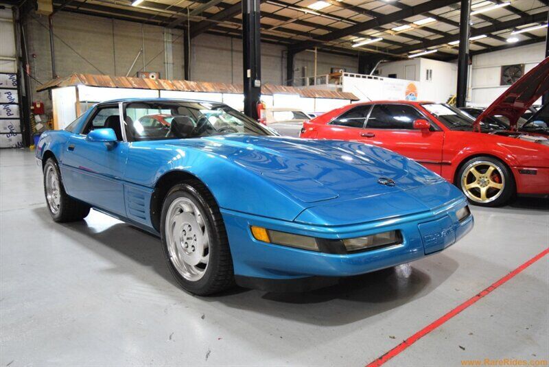 Chevrolet-Corvette-1994-Bright-Aqua-Metallic-Black-133867-9