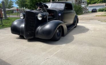 Chevrolet-Deluxe-Coupe-1938-Black-Black-1609-2