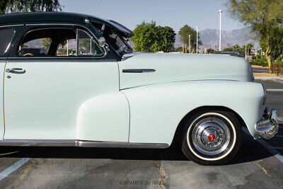 Chevrolet-Fleetmaster-Coupe-1948-Green-Tan-79799-10