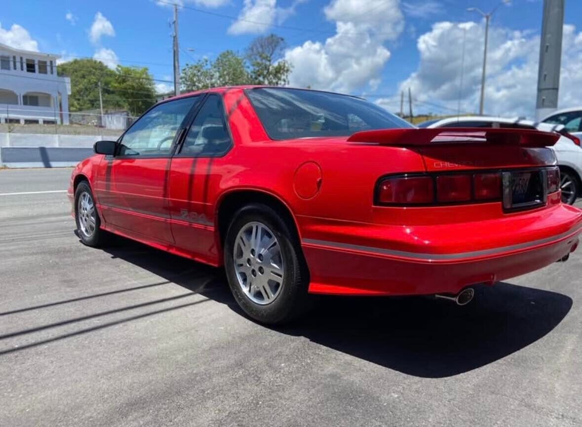 Chevrolet-Lumina-Coupe-1991-Red-Gray-15702-3