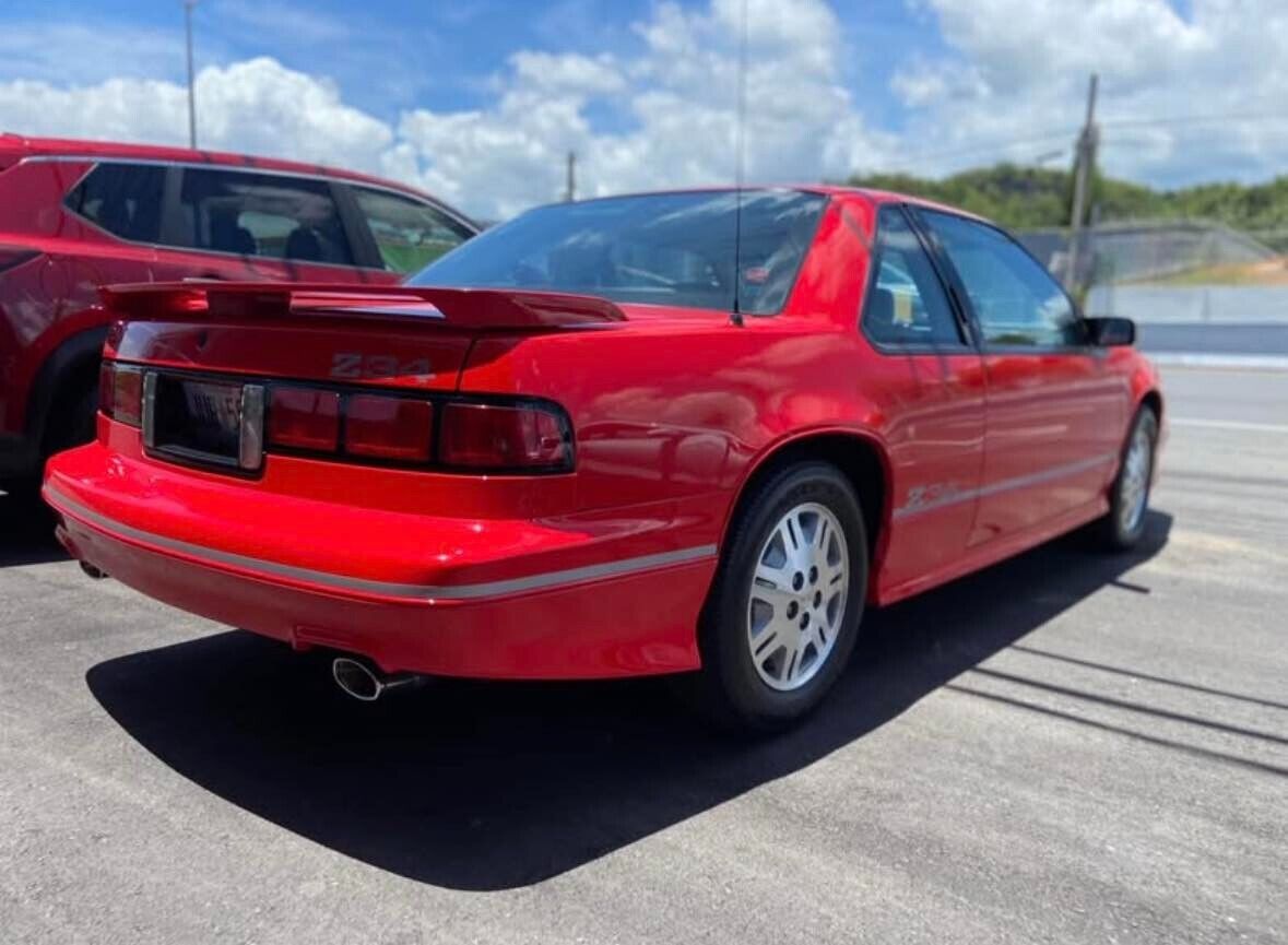 Chevrolet-Lumina-Coupe-1991-Red-Gray-15702-5