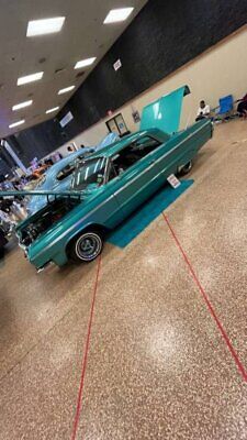 Chevrolet-SS-Coupe-1964-Teal-Black-128748-2