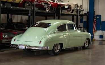 Chevrolet-Special-Fleetline-Berline-1950-Green-Tan-3438-23