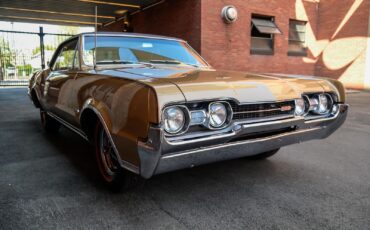 E-Z-GO-Oldsmobile-1967-Gold-Black-8998-2