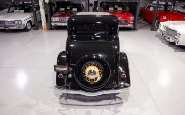 Ford-Model-40-Coupe-1934-Black-Beige-1125-10