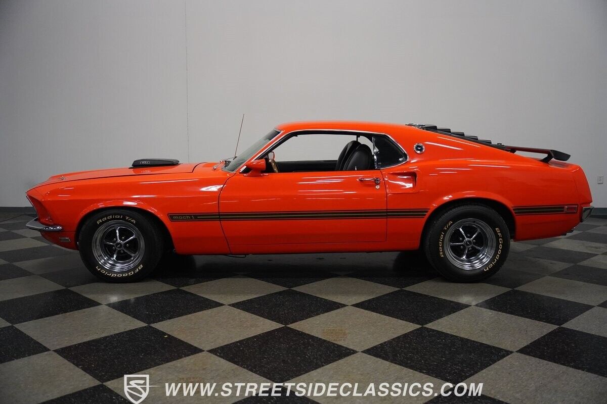 Ford-Mustang-1969-Calypso-Coral-Black-130-2