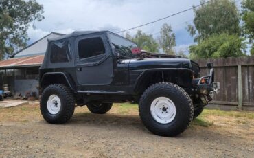 Jeep-Wrangler-1994-black-257494