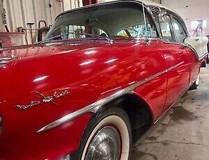 Oldsmobile-98-Berline-1957-Red-102193-2